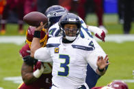 Seattle Seahawks quarterback Russell Wilson (3) passes the ball during the first half of an NFL football game against the Washington Football Team, Sunday, Dec. 20, 2020, in Landover, Md. (AP Photo/Mark Tenally)