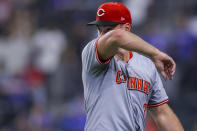 Cincinnati Reds relief pitcher Brent Suter walks to the dugout during the ninth inning of a baseball game against the Texas Rangers in Arlington, Texas, Saturday, April 27, 2024. (AP Photo/Gareth Patterson)