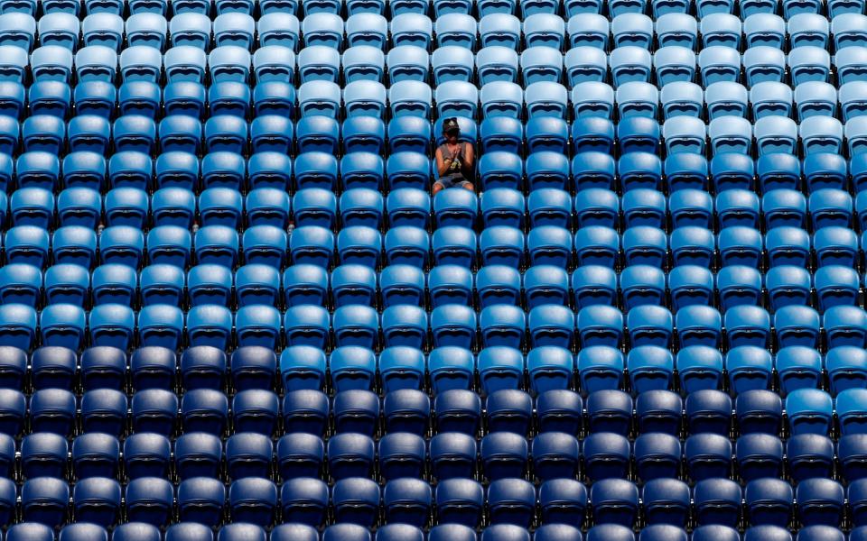 It was announced yesterday that the Australia Open will proceed without crowds over the next five days after the state of Victoria was placed under a snap lockdown to contain a fresh outbreak of the coronavirus  - REUTERS/Asanka Brendon Ratnayake