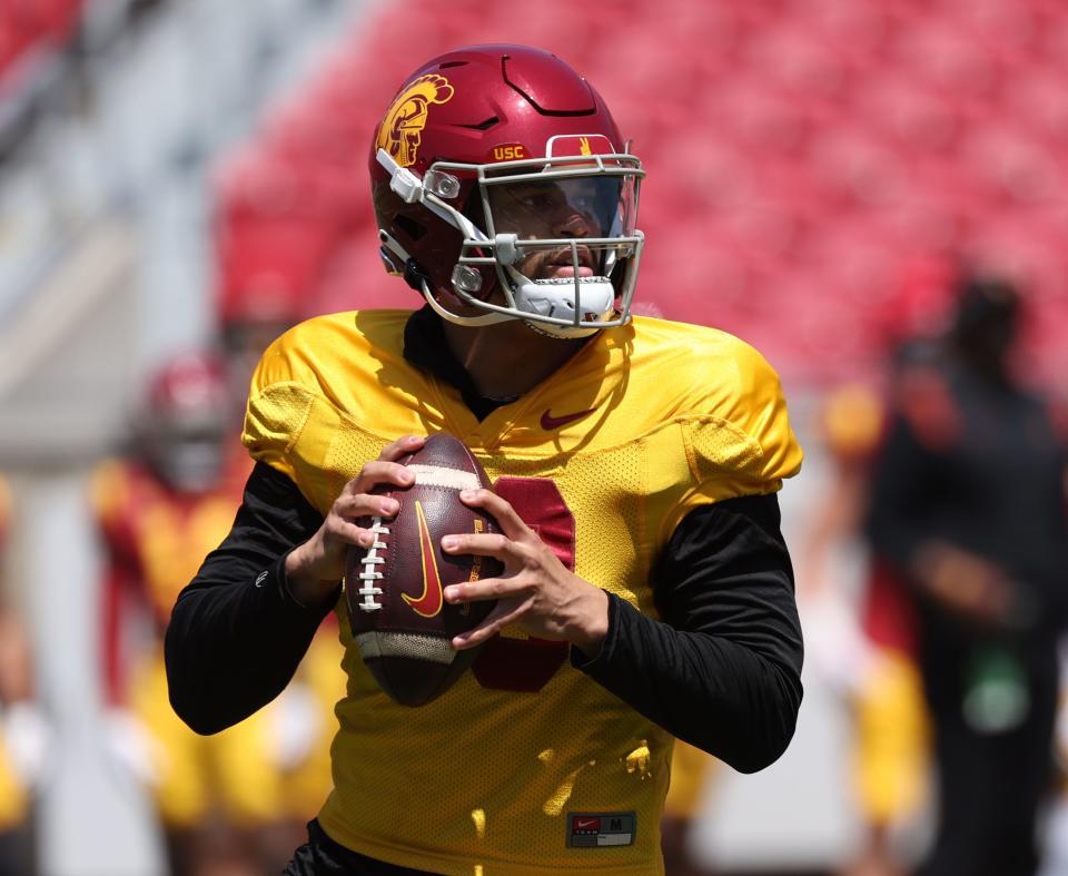 Apr 15, 2023; Los Angeles, CA, USA; USC Trojans quarterback Caleb Williams (13) drops back to pass during the Spring Game at Los Angeles Memorial Coliseum. Mandatory Credit: Kiyoshi Mio-USA TODAY Sports