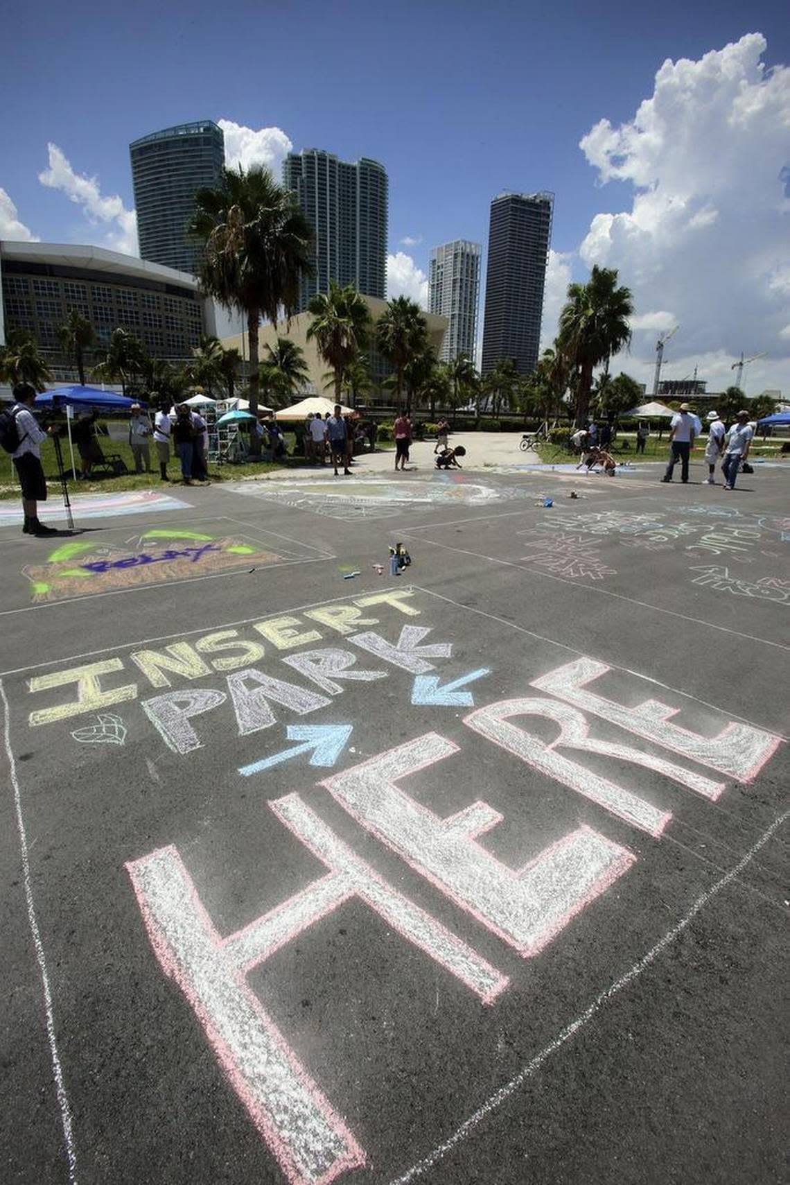 Instructions to “Insert Park Here” were drawn in chalk on the blacktop behind the Miami Heat arena during Engage Miami’s ‘Chalk-tacula’ in 2015.