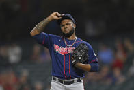 Minnesota Twins relief pitcher Alex Colome (48) reacts after throwing a ball in the eighth inning of a baseball game against the Cleveland Indians, Tuesday, April 27, 2021, in Cleveland. (AP Photo/David Dermer)