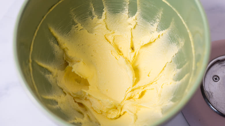 creamed butter and sugar in bowl 