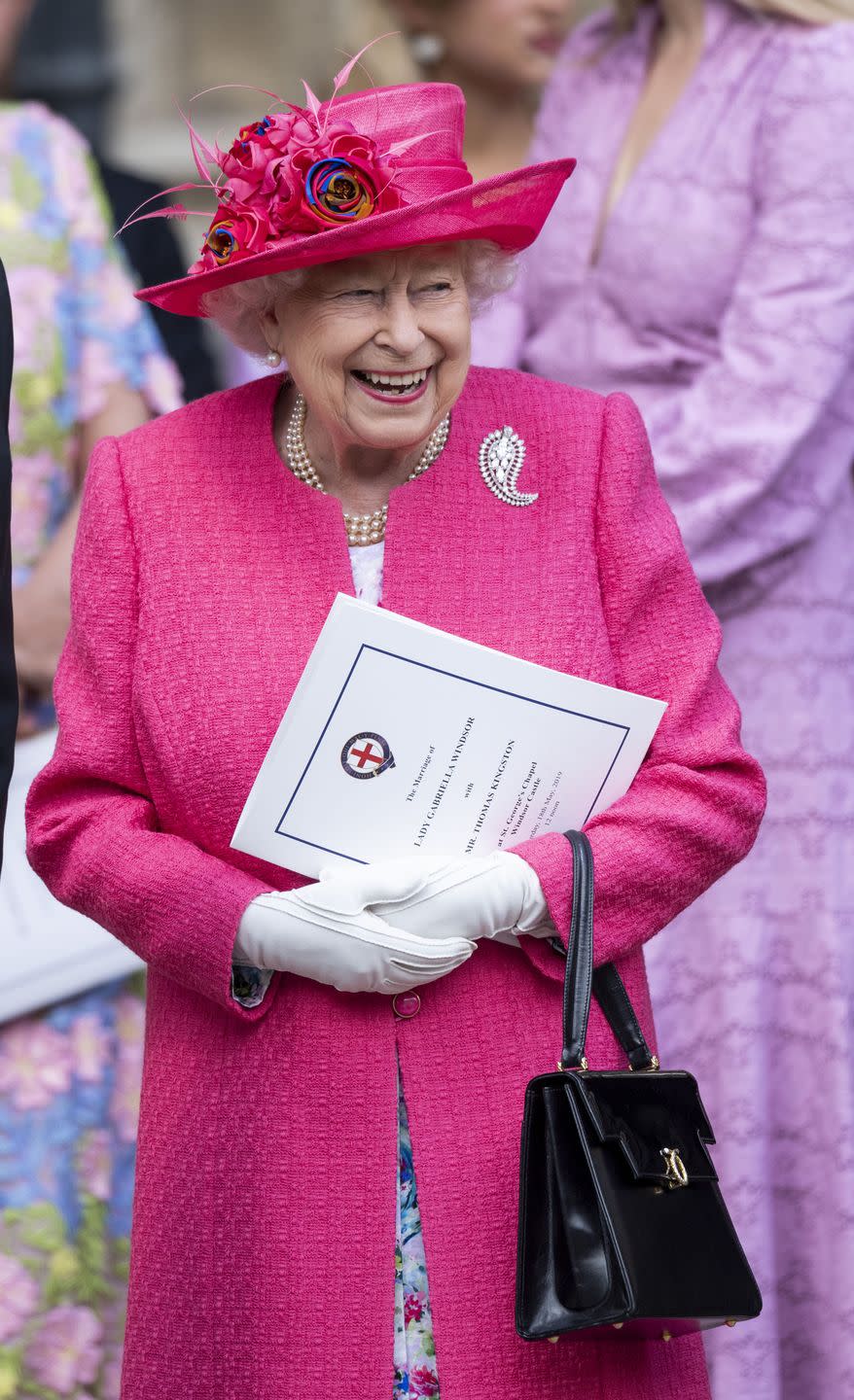 Queen Elizabeth enjoying herself as she leaves the ceremony