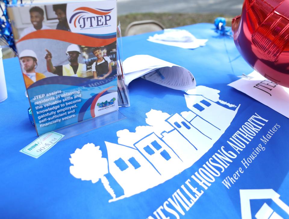 A table set up for information about the Job Training & Entrepreneurial Program at the Gainesville Housing Authority's Black Owned Business Celebration, in the Pine Meadows neighborhood in Gainesville on Feb. 4.