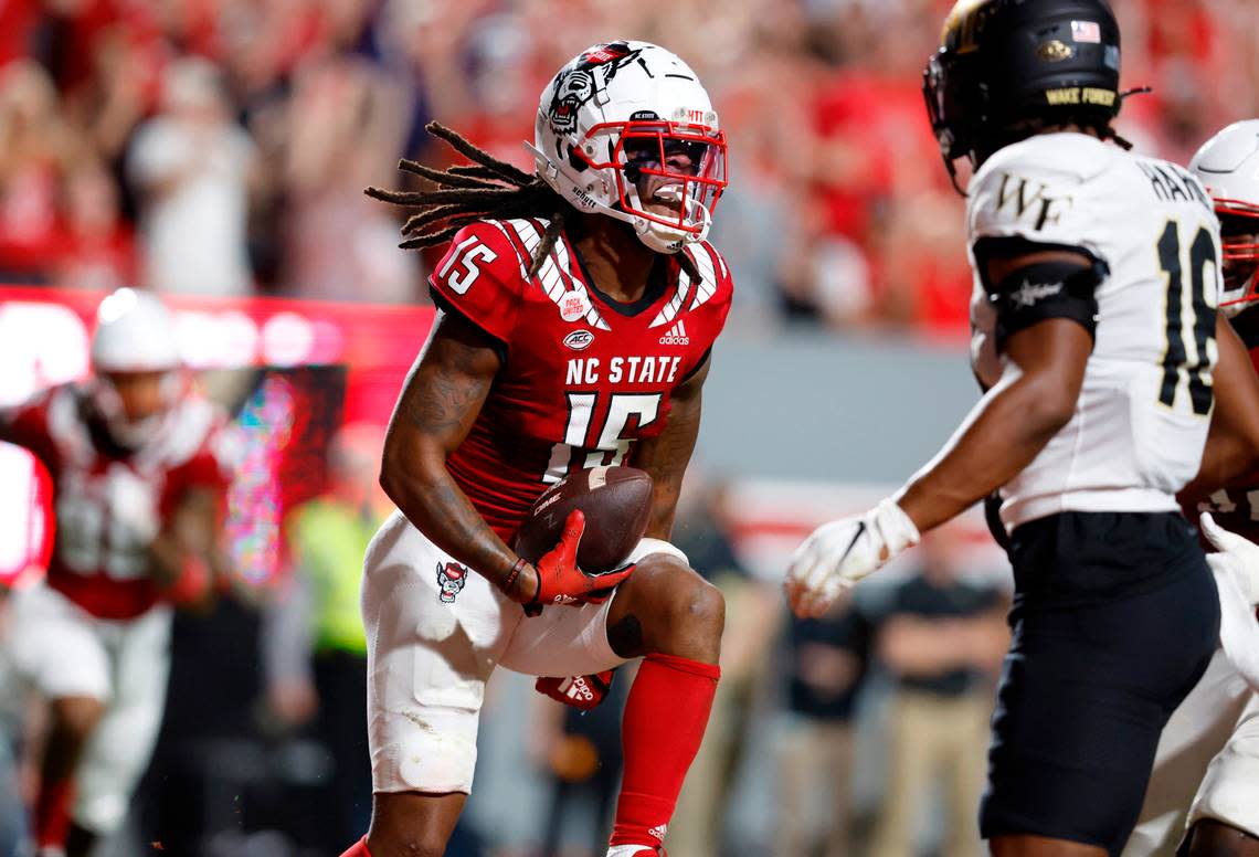 N.C. State wide receiver Keyon Lesane (15) celebrates after making a 12-yard touchdown reception during the first half of N.C. State’s game against Wake Forest at Carter-Finley Stadium in Raleigh, N.C., Saturday, Nov. 5, 2022.