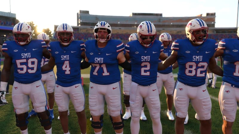 SMU players celebrate a victory following a simulated game between BYU and SMU in the new EA Sports College Football 25 video game. | EA Sports College Football 25