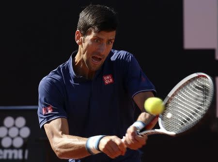 Tennis - WTA - Rome Open - Men's Singles Final - Novak Djokovic of Serbia v Alexander Zverev of Germany - Rome, Italy- 21/5/17- Djokovic returns the ball. REUTERS/Alessandro Bianchi