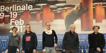 Monika Preischl (L-R), editors Olaf Voigtlander, Stephan Krumbiegel, producer Thomas Kufus and director Andres Veiel attend a news conference to promote the movie 'Beuys' at the 67th Berlinale International Film Festival in Berlin, Germany, February 14, 2017. REUTERS/Axel Schmidt