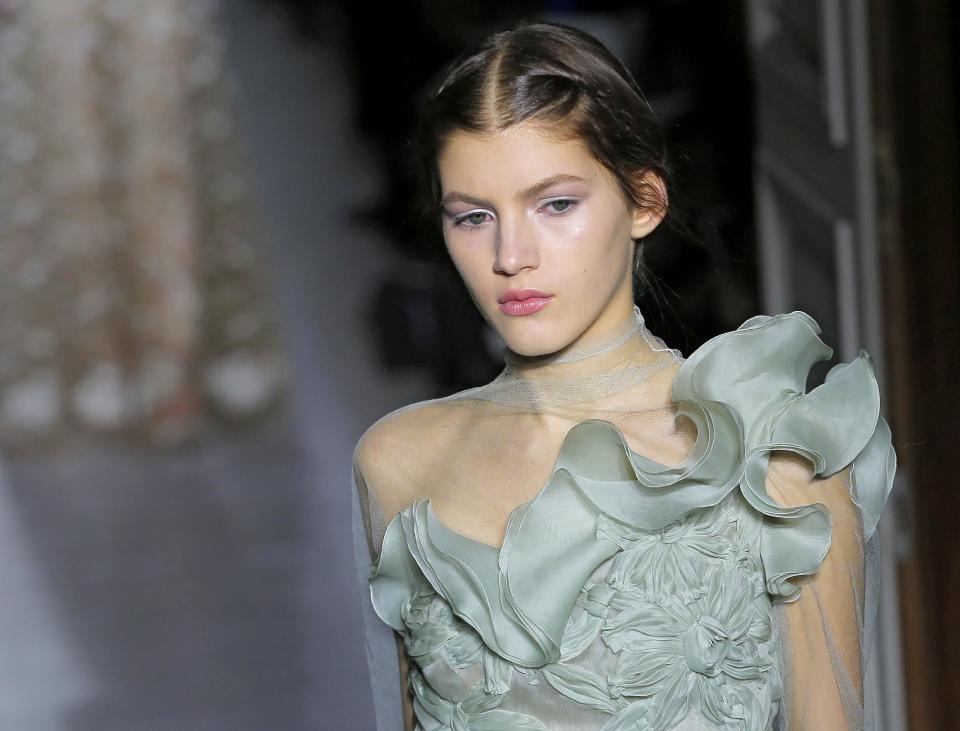 A model wears a creation by fashion designers Maria Grazia Chiuri and Pier Paolo Piccioli for Valentino as part of the Women's Spring/Summer 2013 Haute Couture fashion collection presented in Paris, Wednesday, Jan. 23 2013 (AP Photo/ Jacques Brinon)