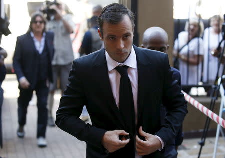 South African Olympic and Paralympic sprinter Oscar Pistorius arrives at the North Gauteng High Court in Pretoria, April 18, 2016. REUTERS/Mike Hutchings