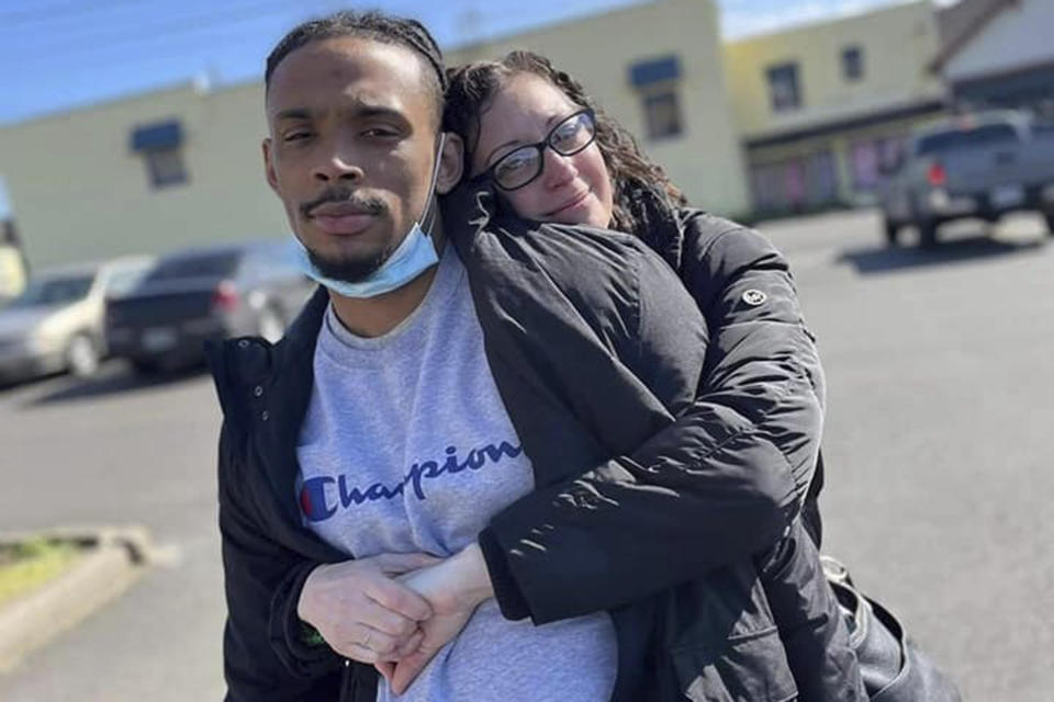 This undated photo released by the Clark family's legal representatives, shows Derrick Clark Jr., left, with an unidentified person. Police officers in Oregon shot and killed Clark Jr., a 24-year-old Black man, in the back and then instead of providing medical care, mocked his lifeless body, threw explosives at him and sent a dog to attack his corpse, his family alleges in an updated lawsuit filed Thursday with additional details from the 2022 shooting. (Courtesy of the Clark family via AP)