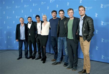 Cast members Burghart Klaussner, Roman-Timothy Rien, Mohsin Ahmady, Austrian director, producer and screenwriter Feo Aladag, Ronald Zehrfeld, Felix Kramer, Pit Bukowski and Tobias Schoenenberg (L-R) pose during a photocall to promote the movie "Zwischen Welten" (Inbetween Worlds) during the 64th Berlinale International Film Festival in Berlin February 11, 2014. REUTERS/Stefanie Loos