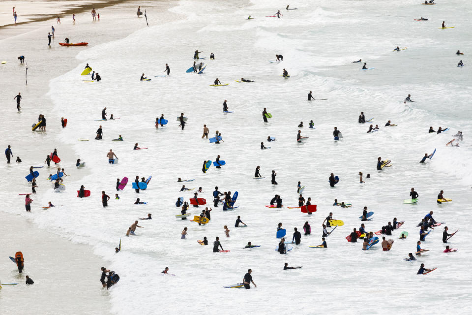 Distance shot of people swimming in the sea