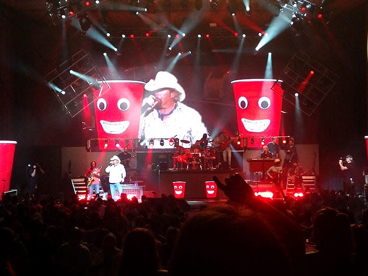 Toby Keith sings his hit single "Red Solo Cup" at Blossom Music Center Sunday night during his "Shut Up & Hold On" Tour.