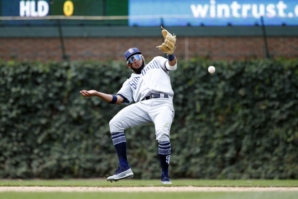 CHICAGO, IL - JULY 20: Fernando Tatis Jr. #23 of the San Diego Padres bobbles the ball after a bad hop while trying to field a grounder against the Chicago Cubs at Wrigley Field on July 20, 2019 in Chicago, Illinois. The Cubs won 6-5. (Photo by Joe Robbins/Getty Images)