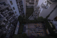 In this Wednesday, June 3, 2020 photo the Panathinea outdoor cinema in Neapoli, central Athens, is seen in an aerial view as moviegoers watch the 2019 South Korean black comedy film Parasite. (AP Photo/Petros Giannakouris)