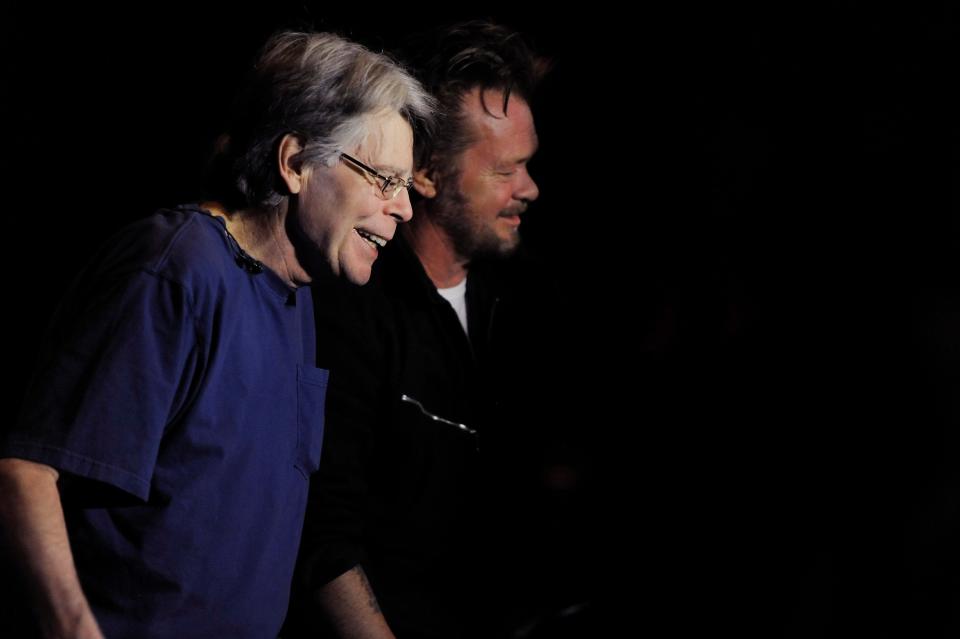 Writer, Stephen King and singer John Mellencamp during television interviews after a dress rehearsal of the John Mellencamp and Stephen King collaboration of Ghost Brothers at the Indiana University Auditorium in Bloomington, Ind. Tuesday, Oct. 8, 2013.