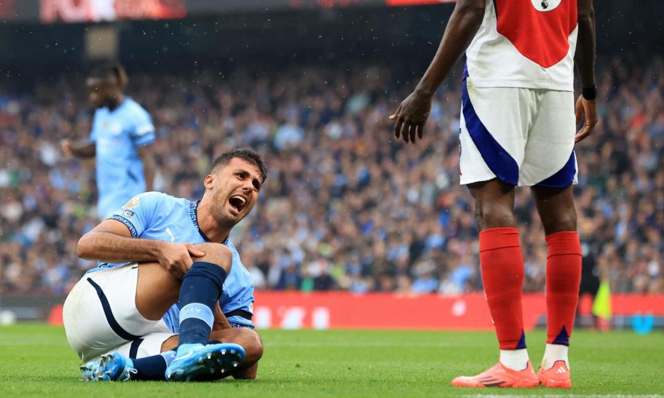 <span>Pep Guardiola said Manchester City are waiting for doctors to decide ‘what type of surgery’ Rodri needs.</span><span>Photograph: David Blunsden/Action Plus/Shutterstock</span>