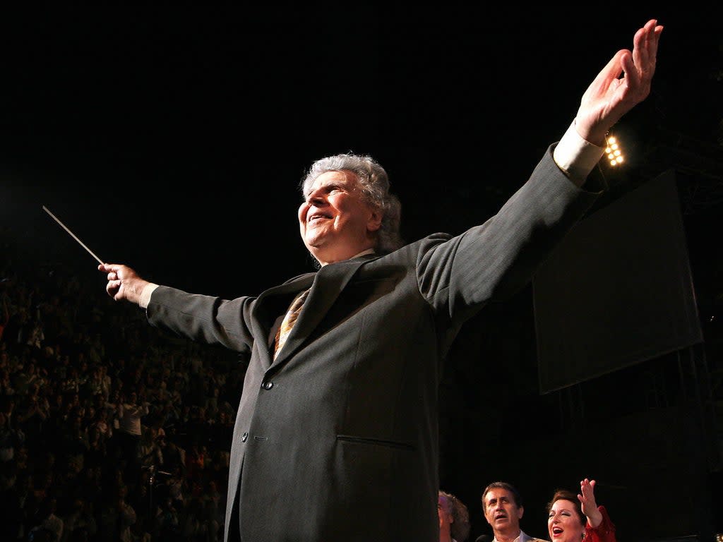 Theodorakis directing his orchestra during a gala concert at the Herodes Atticus Ancient Theatre in Athens (AFP/Getty)