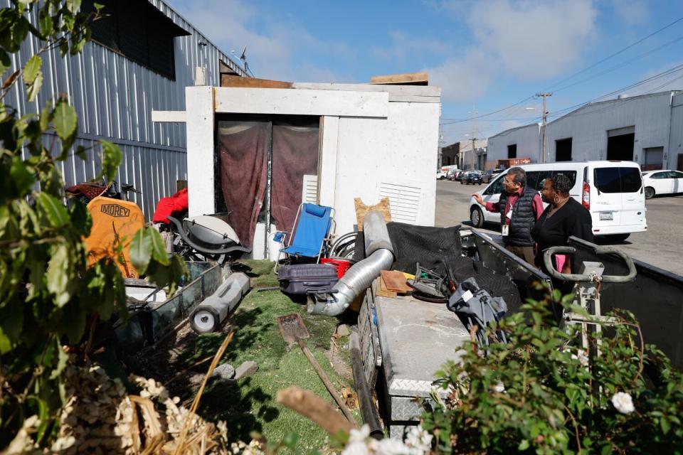 Efrain Sandoval and Cynthia Scott of Catholic Charities SF visit homeless they are trying to find housing for