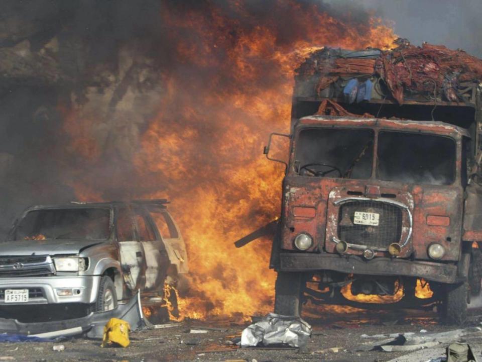 Vehicles burn at the scene of a massive explosion in front of Safari Hotel in the Somali capital Mogadishu (EPA)