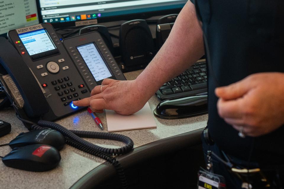 Angela Vorhies, Communications Commander with Austin Travis-County EMS, takes a call at the Combined Transportation, Emergency and Communications Center (CTECC) Thursday, June 20, 2024.