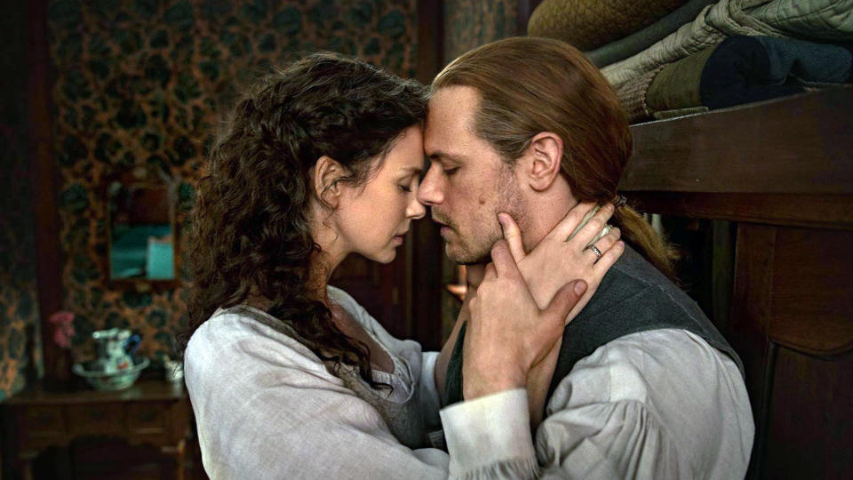 Caitríona Balfe as Claire Fraser and Sam Heughan as Jamie Fraser in Outlander season 6