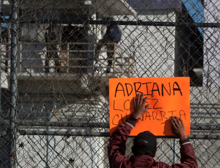 A relative of an inmate waits outside the Topo Chico prison in the northern city of Monterrey on February 11, 2016