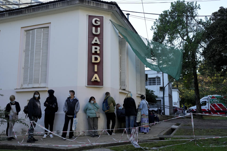 Patients with dengue symptoms wait to be attended at a hospital in Buenos Aires, Argentina, Friday, April 5, 2024. A nationwide increase in dengue fever cases as resulted in the demand for repellents to avoid the bite of the mosquito that transmits the disease, causing a shortage and exorbitant prices where available. (AP Photo/Natacha Pisarenko)