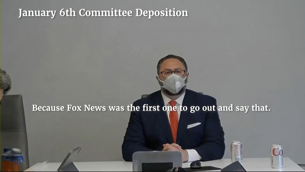 In this image from video released by the House Select Committee, Jason Miller speaks during a video deposition to the House select committee investigating the Jan. 6 attack on the U.S. Capitol, that was shown as an exhibit at the hearing Monday, June 13, 2022, on Capitol Hill in Washington. 