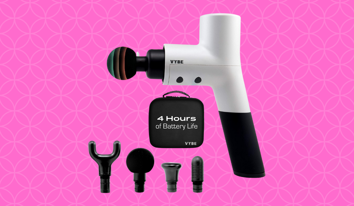 A white and black targeted massager with additional attachments