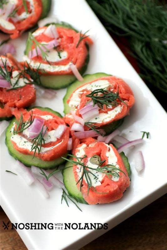 <p>Noshing with the Nolands</p><p>These delectable bites offer a tasty and flavorful finger food that will bring a whole new level of class to your graduation party.</p><p><strong>Get the recipe: <a href="http://noshingwiththenolands.com/smoked-salmon-twirls/" rel="nofollow noopener" target="_blank" data-ylk="slk:Smoked Salmon Twirls;elm:context_link;itc:0;sec:content-canvas" class="link ">Smoked Salmon Twirls</a></strong></p>