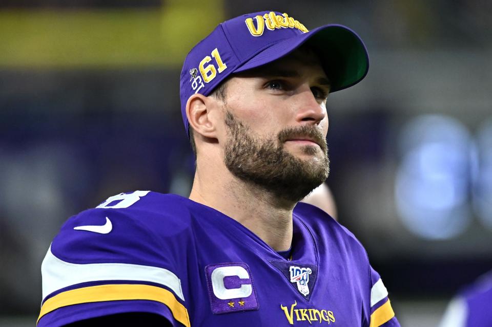 MINNEAPOLIS, MINNESOTA - DECEMBER 23: Quarterback Kirk Cousins #8 of the Minnesota Vikings looks on from the sidelines during the game against the Green Bay Packers at U.S. Bank Stadium on December 23, 2019 in Minneapolis, Minnesota. (Photo by Stephen Maturen/Getty Images)