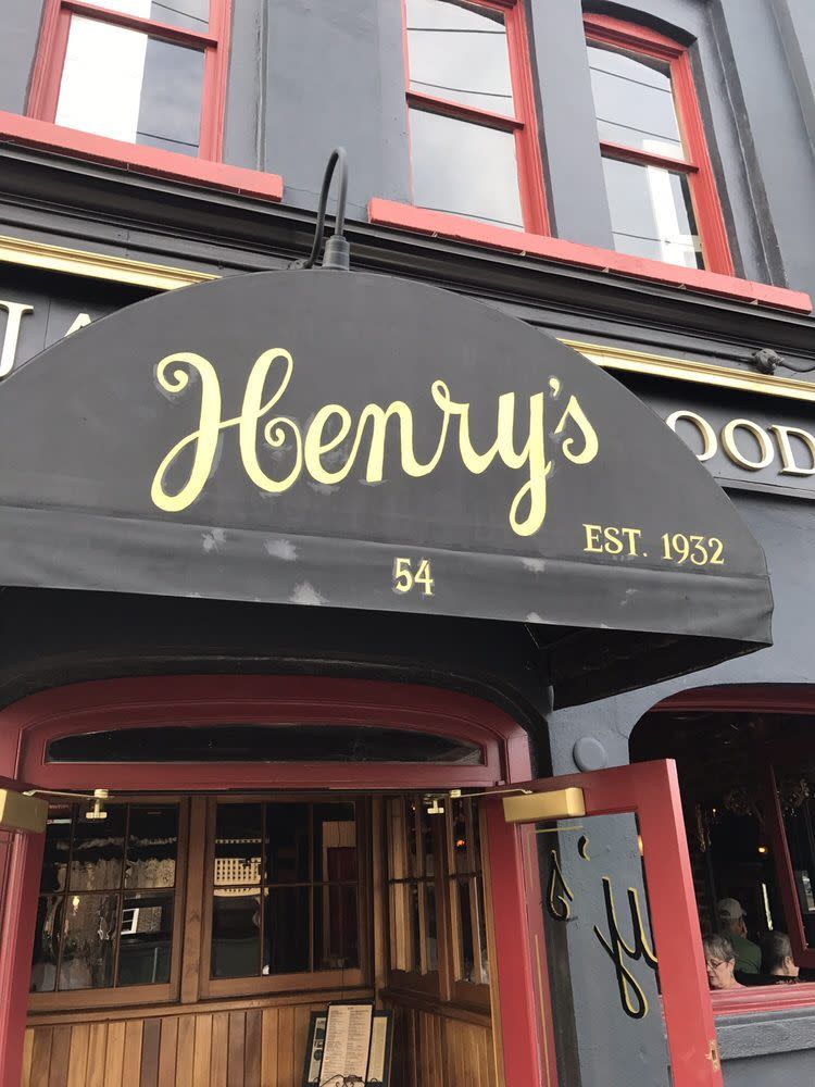 <p>Head to North Market Street in downtown Charleston for a true taste of the city's history. This was <a href="https://www.tripadvisor.com/Restaurant_Review-g54171-d1526353-Reviews-Henry_s_Bar_and_Restaurant-Charleston_South_Carolina.html" rel="nofollow noopener" target="_blank" data-ylk="slk:one of the first fish houses;elm:context_link;itc:0;sec:content-canvas" class="link ">one of the first fish houses</a> in town, and the restaurant still whips up classic lowcountry fare like shrimp and grits, crab soup and crab cakes, made from a fourth generation family recipe.</p>