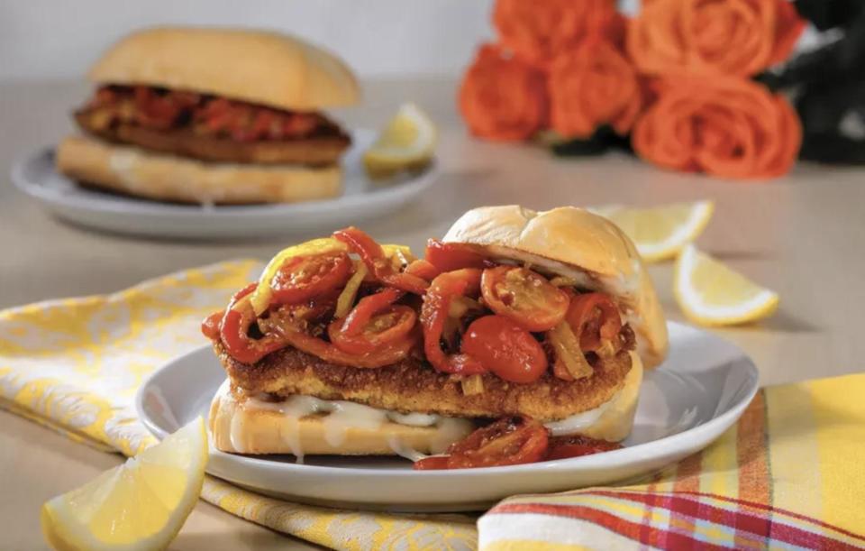 <p>A classic sandwich if there ever was one. Add some jarred hot cherry peppers, grape tomatoes, yellow bell peppers and of course, mozzarella cheese, for the ultimate chicken parmesan in a hoagie roll. </p> <p><a href="https://www.thedailymeal.com/best-recipes/chicken-parmesan-sandwich?referrer=yahoo&category=beauty_food&include_utm=1&utm_medium=referral&utm_source=yahoo&utm_campaign=feed" rel="nofollow noopener" target="_blank" data-ylk="slk:For the Chicken Parmesan Sandwich recipe, click here.;elm:context_link;itc:0;sec:content-canvas" class="link ">For the Chicken Parmesan Sandwich recipe, click here. </a></p>