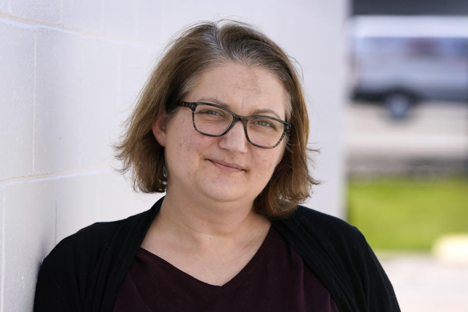 Elesha Gayman, Democratic chairwoman in Scott County, Iowa, stands outside her office, Wednesday, May 26, 2021, in Davenport, Iowa. Iowa's 2nd Congressional District race last year might have ignited a rally from Democrats whose six-vote loss was the narrowest for any U.S. House seat in almost 40 years. (AP Photo/Charlie Neibergall)