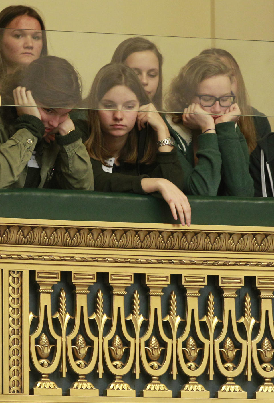 Visitors look down from the balcony onto the plenary room, as Belgian politicians gather to vote the bill on child euthanasia at the Belgian federal parliament in Brussels, Thursday Feb. 13, 2014, extending to children a legal option already possessed by the country's adults. The legislation appears to have wide support in the largely liberal country. But it has also aroused intense opposition from foes, including a list of paediatricians, and everyday people who have staged street protests. (AP Photo/Yves Logghe)