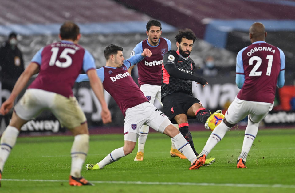 Liverpool's Mohamed Salah scores their first goal against West Ham.