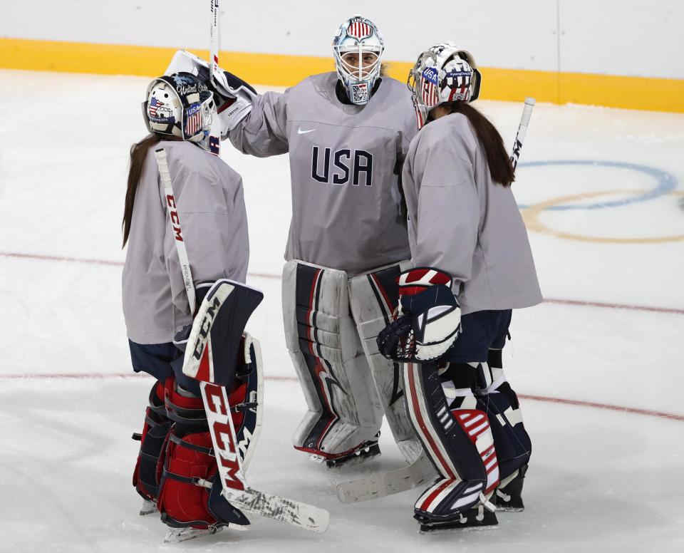 Team USA goaltenders Alex Rigsby and Nicole Hensley may have to change their helmets. REUTERS