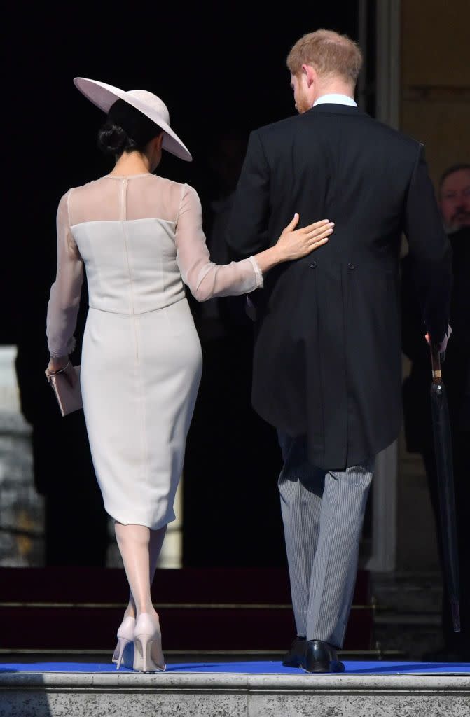 The Duchess of Sussex shows off a bit of affection to her new husband.