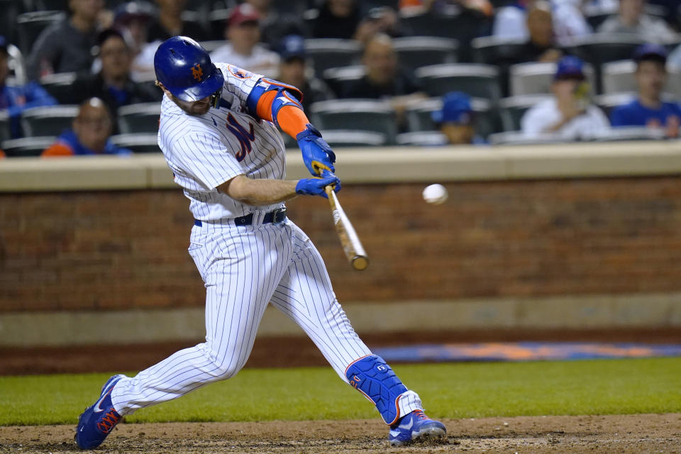 New York Mets' Pete Alonso hits a three-run home run against the St. Louis Cardinals during the eighth inning of a baseball game Wednesday, May 18, 2022, in New York. The Mets won 11-4. (AP Photo/Frank Franklin II)