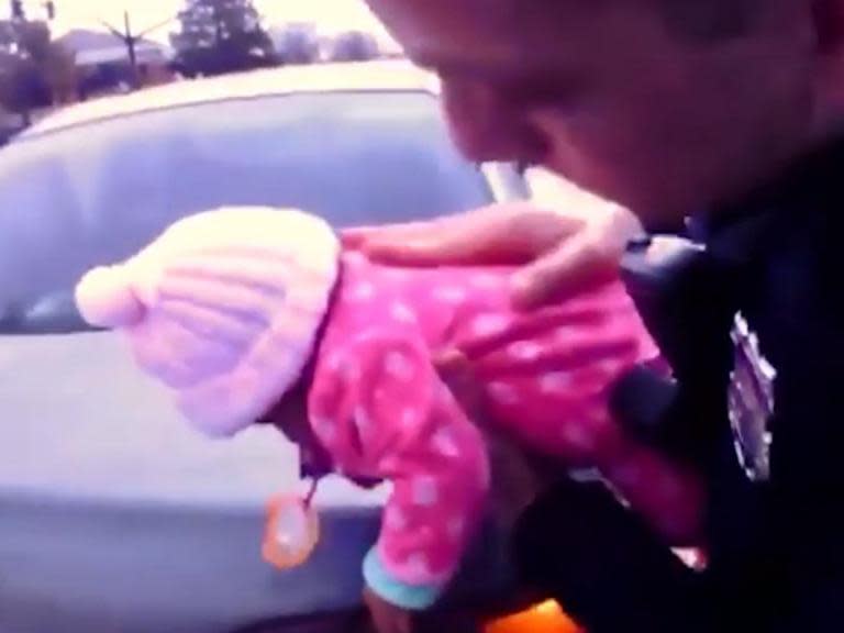 Police officers save life of choking baby in body camera footage