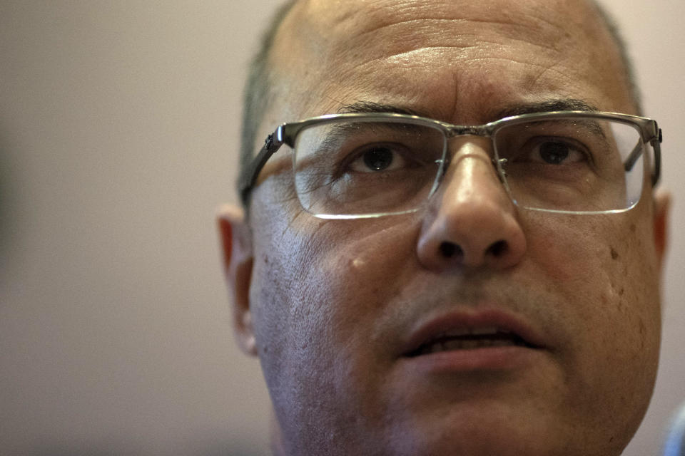 In this July 22, 2019 photo, Rio de Janeiro Gov. Wilson Witzel speaks about public security during a press conference in Rio de Janeiro, Brazil. Witzel is pushing to give police a freer hand saying that police should lose their "fear of killing." (AP Photo/Leo Correa)