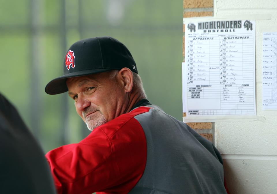 Oak Hills head coach Chuck Laumann looks on from the Highlanders' dugout. Oak Hills defeated Sycamore 5-0.