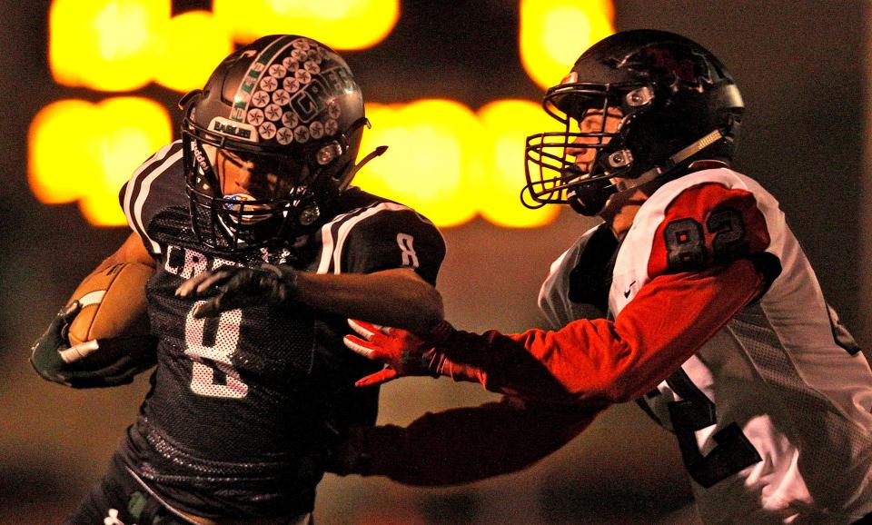 Raymond Saavedra (8) rushes the ball for Grape Creek during a game against Ingram on Friday, Nov. 5, 2021.