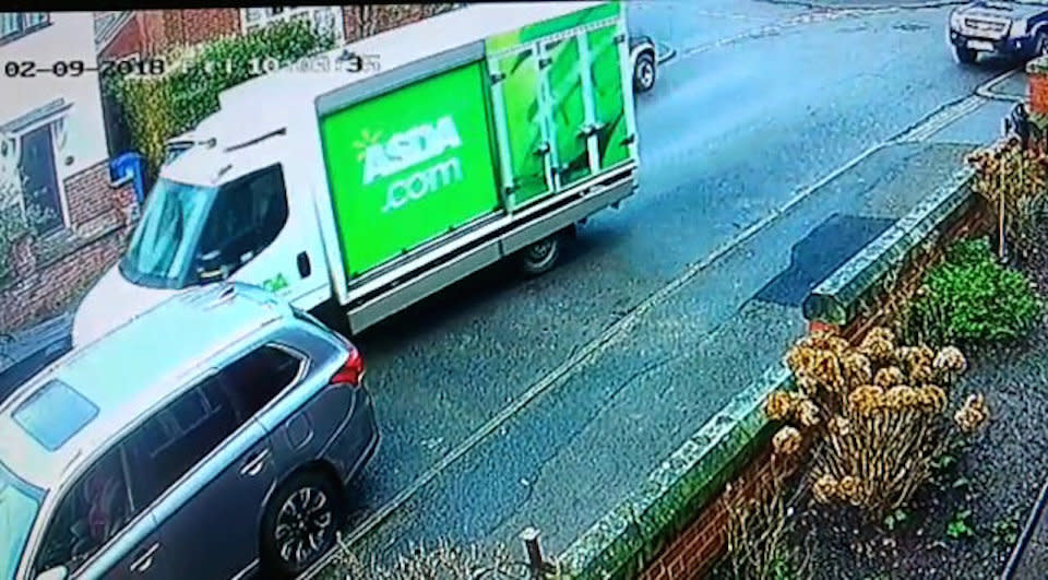 The Asda van was caught on CCTV (Picture: SWNS)