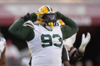 Green Bay Packers defensive tackle Tedarrell Slaton (93) celebrates during the first half of an NFL football game against the San Francisco 49ers in Santa Clara, Calif., Sunday, Sept. 26, 2021. (AP Photo/Tony Avelar)