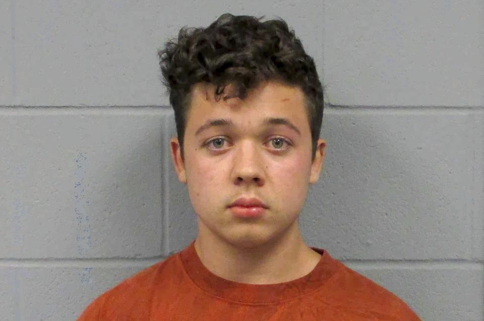 This undated booking photo from the Antioch (Illinois) Police Department shows Kyle Rittenhouse, who has been charged with fatally shooting two men and injuring a third during protest in Kenosha, Wis., in late August. In an interview with the Chicago Tribune, Wendy Rittenhouse said neither her son nor the protesters should have been on the street that night and put much of the blame for what happened on police and the governor. “The police should have helped the businesses out instead of having a 17-year-old kid helping him," she said. “The police should have been involved with these people that lost their businesses. They should have stepped up." (Antioch Police Department/Chicago Tribune via AP)