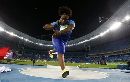 2016 Rio Olympics - Athletics - Final - Women's Shot Put Final - Olympic Stadium - Rio de Janeiro, Brazil - 12/08/2016. Michelle Carter (USA) of USA competes on her way to the gold medal in the women's shot put. REUTERS/Kai Pfaffenbach